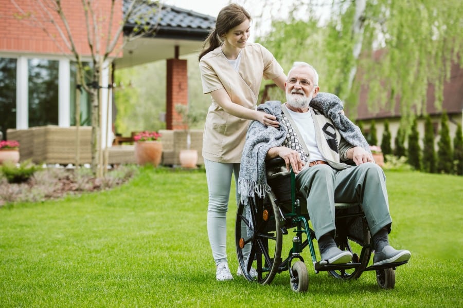 Caregiver supporting a senior client at home in Edmonton